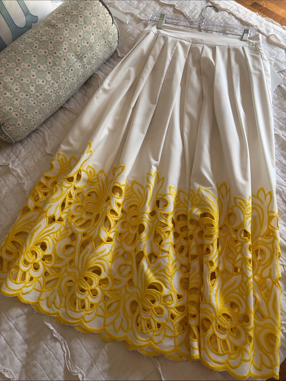 Elegant Cream Midi Skirt with Yellow Embroidered Hem